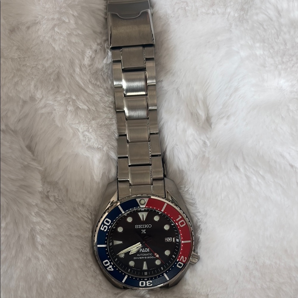 Seiko Men's Watch with Blue and Red Bezel